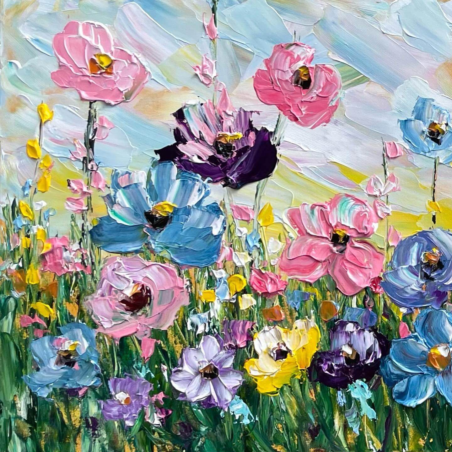 Painting of wild flowers on a green field by Giselle Denis.