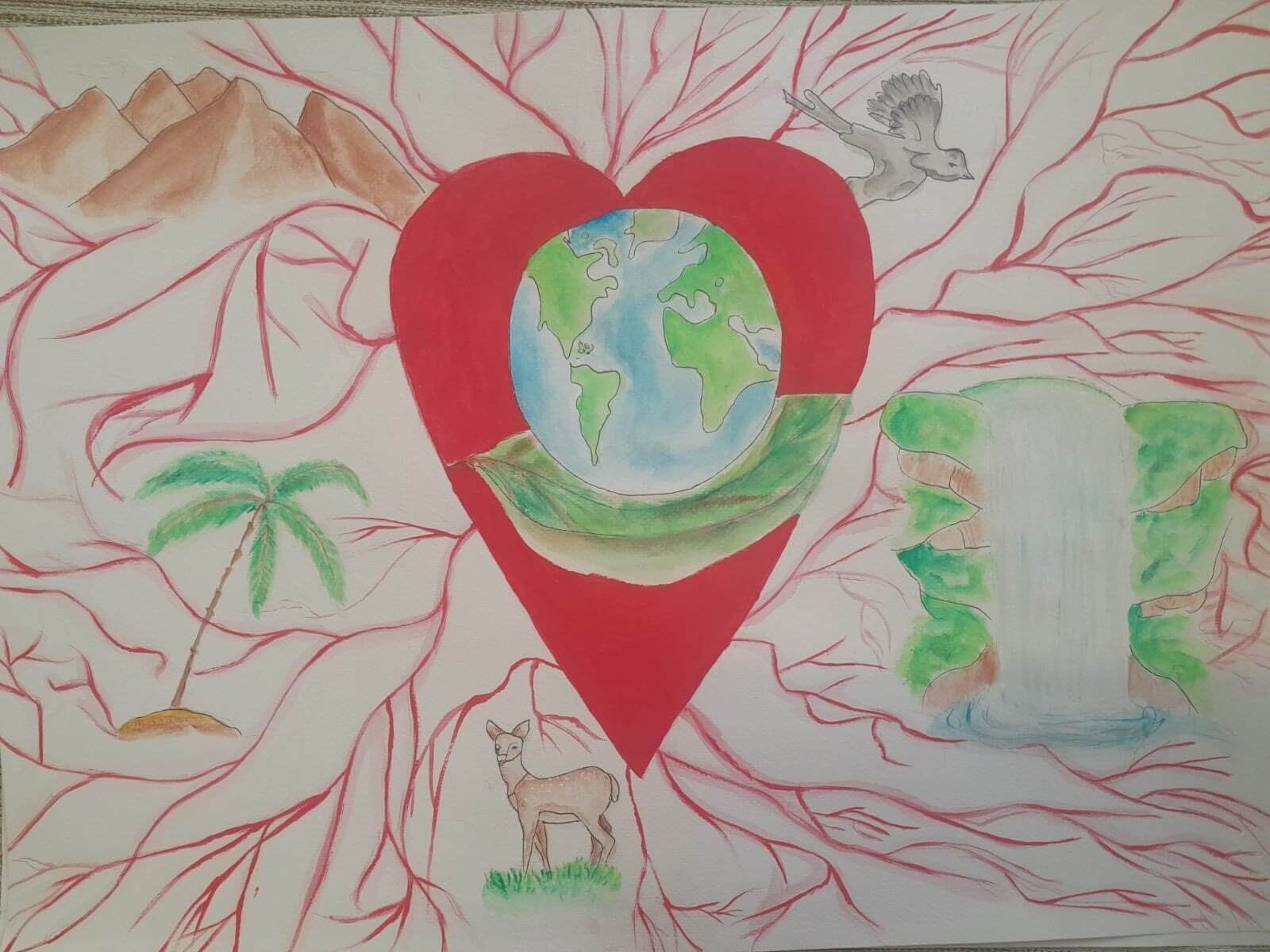 Child drawing by young artist Stefania, representing the planet Earth inside a heart.